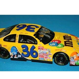 Action Bank Diecast NASCAR ERNIE IRVAN #36 M&M Millenium Countdown 99 Pontiac